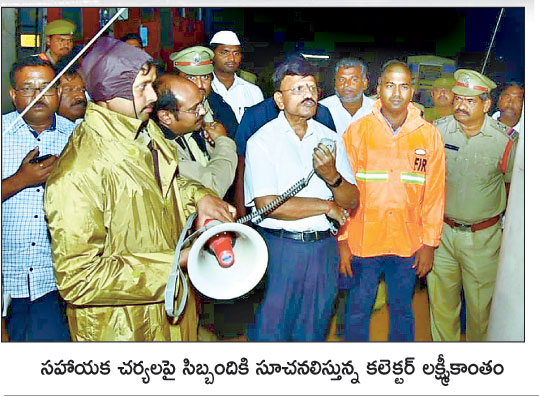 Collector giving instructions to staff for Cyclone relief operations.jpg